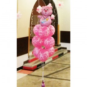 Композиция из воздушных шаров для выписки из роддома розовый мишка с соской